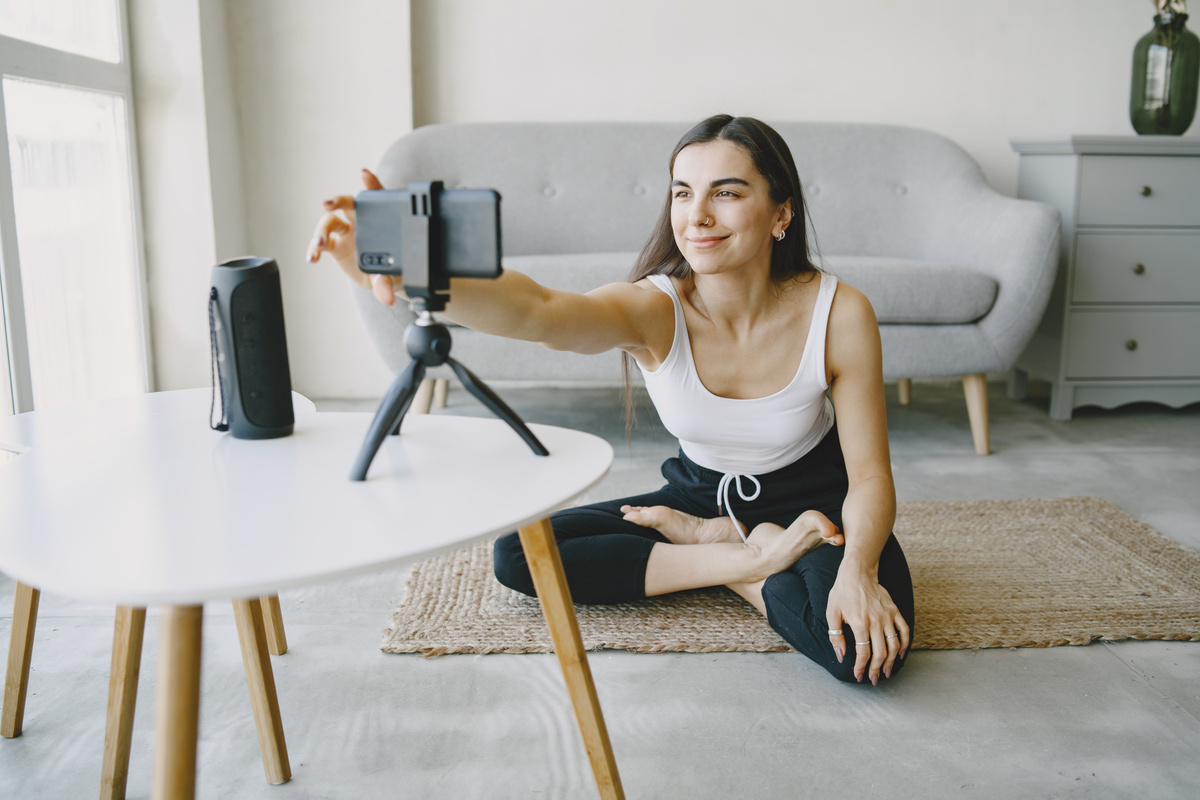 Woman Recording Self in Cellphone at Living Room